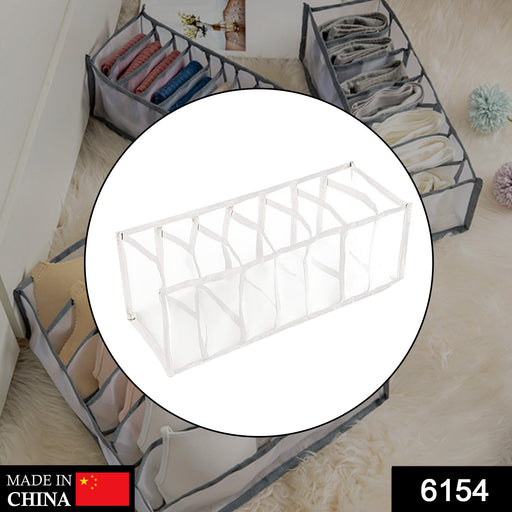 A circular inset shows a white mesh organizer with seven empty compartments, surrounded by other filled organizers on a