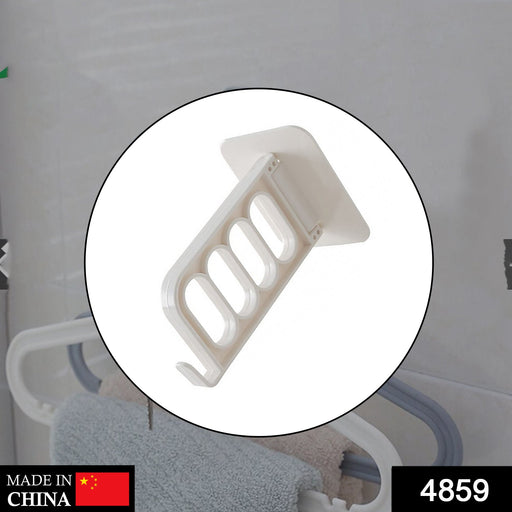 A circular inset shows a white plastic foldable wall hook with four slots and a hook, against a blurred background.