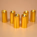 Three elegant golden LED candles creating a warm glow for home decor.
