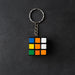 Detailed view of a Mini Magic Cube Puzzle keychain with bright, engaging colours.