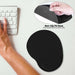 A hand typing on a keyboard next to the black mouse pad, with an inset showing its non-slip PU base.