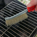 The versatile stainless steel wire brush effectively removing grime.