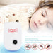 White and black pest repeller with a grey button in front of a sleeping child, with text and pest icons.