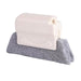Flexible bristles of the crevice cleaning brush reaching tight spaces.