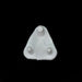 A single white plastic child safety socket cover, triangular with three prongs, viewed from directly above on a black