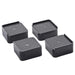 Four heavy-duty base stands arranged, ready to support a cupboard or refrigerator.