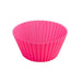A single bright pink fluted silicone cupcake mold is shown on a plain white background.