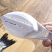 The Quickslice Fish Scale Scraper displayed on a clean surface.