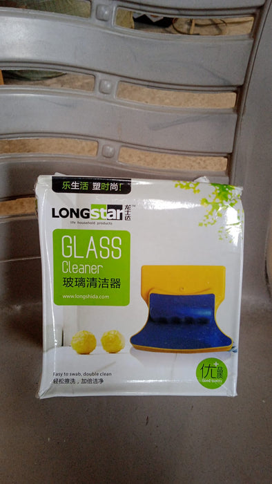 The product's retail packaging, labeled "LONGSTAR GLASS Cleaner," resting on a chair.