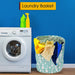 Mint green laundry hamper with kitchen utensil pattern, filled with colorful clothes next to a washing machine.