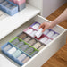 Transparent multi-purpose organizer tray for neatly storing small household items.