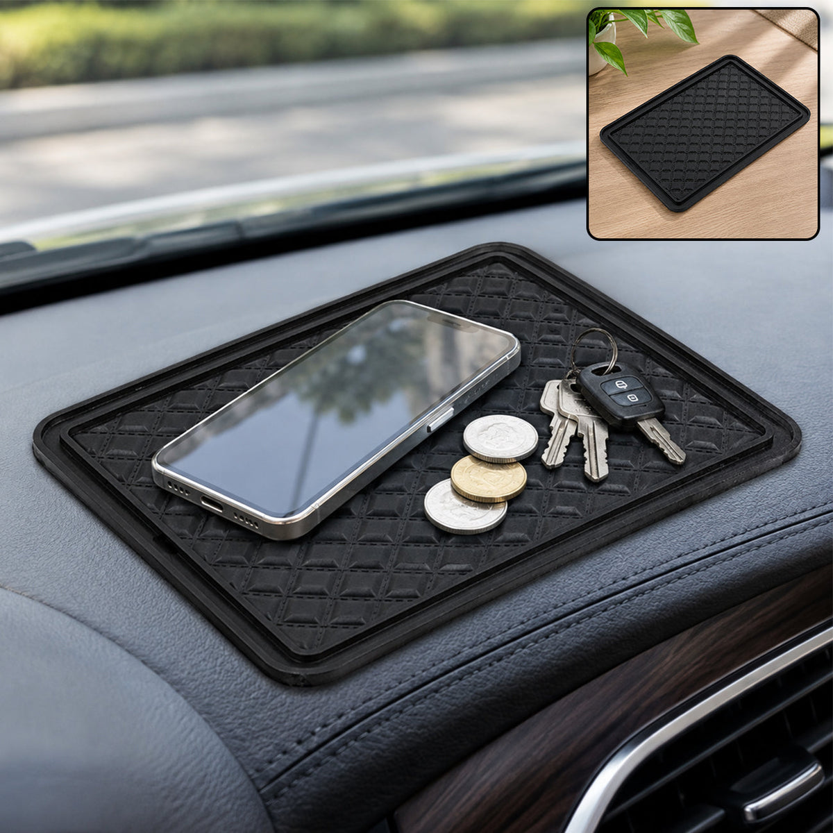 A black anti-skid mat on a car dashboard holds a smartphone, coins, and car keys. An inset shows the mat alone.