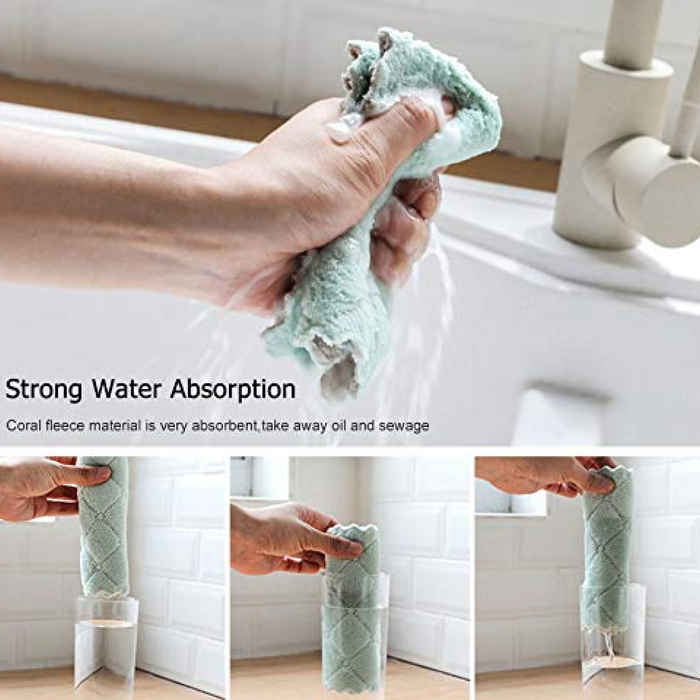 A hand wrings out a wet, light green microfiber towel over a sink, demonstrating its water absorption.