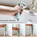 A hand wrings out a wet, light green microfiber towel over a sink, demonstrating its water absorption.
