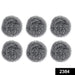 Heavy-duty stainless steel scrubber tackling tough grease on utensils.