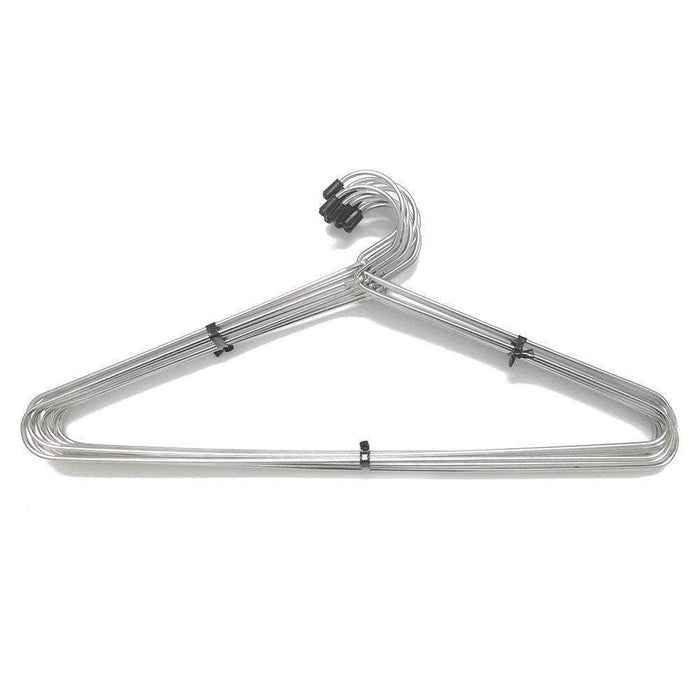 Stack of space-saving stainless steel hangers, highlighting their slim profile for closet organization.