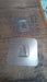 Lifestyle image of GlimmerHome heavy-duty adhesive hooks used for various home organization needs.
