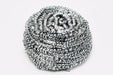 Round stainless steel scrubber showing its intricate wire design for superior scrubbing.