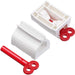 Two white plastic tube squeezers and a detached red winding key are displayed on a white background