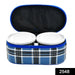 Three round stainless steel tiffin containers neatly stacked.