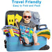 A baby in sunglasses sits in an open blue suitcase, holding a folded water mat, surrounded by travel items.
