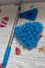 The complete Velvet Wipe triangle mop with its extendable handle ready for use.