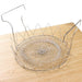 Collapsible strainer basket made of stainless steel, designed for compact, space-saving storage.