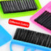 Durable small dustpan and brush set, essential for household and office cleanliness.