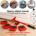 Furniture shifting tools placed under a heavy wardrobe, ready for effortless movement.
