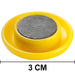 Kids' magnetic buttons securely sticking to a metal surface.