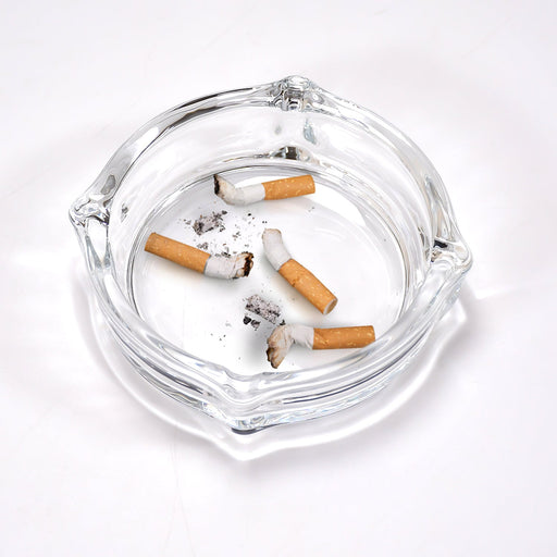 Crystal glass ashtray with a unique faceted design, ideal for cigars and cigarettes.