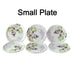 Complete 32-piece plastic dinner set, showcasing various plates and utensils.