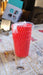 Lifestyle shot of unbreakable plastic glasses filled with a refreshing drink.
