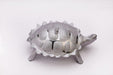 Stylish tortoise-shaped container, ideal for serving snacks.