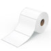 A large roll of white thermal labels with a brown core, showing several blank labels unrolled on a white background.