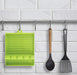 Compact silicone spatula holder and utensil rest for Indian kitchens.