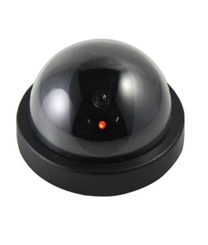 Black dome dummy security camera with a red light on a plain white background.