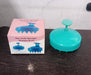 Packaging of the Calm & Curl scalp massager brush, highlighting key features.