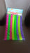 The vibrant 8-piece hula hoop set displayed vertically.