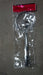 Frying filter spoon with clip used in a modern kitchen setting.