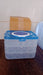 Portable egg storage box with a handle, ideal for safe transport of eggs.