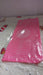 Hands rolling dough on the silicone baking mat, utilizing its non-stick property and guides.