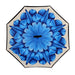 The open canopy of a reverse umbrella reveals a large, intricate blue floral design on a light background.