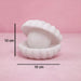 Front view of the glowing Pearl Shell Night Lamp, perfect for bedroom mood lighting.