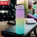 Side view of the Hydrozilla Motivational Water Bottle, highlighting the convenient flip-up straw and carry strap.