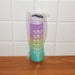 Motivational Water Bottle placed next to gym gear, perfect for fitness enthusiasts and active lifestyles.