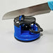 Efficient kitchen knife sharpener with a secure suction cup mount.