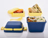Blue 3-compartment airtight lunch box with ergonomic handle & secure push lock.