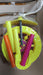 The durable plastic construction of the light-up single wheel push toy.