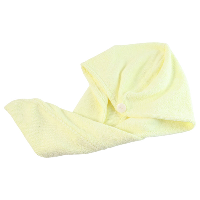 A yellow microfiber hair drying wrap towel with a white button is folded on a white background.
